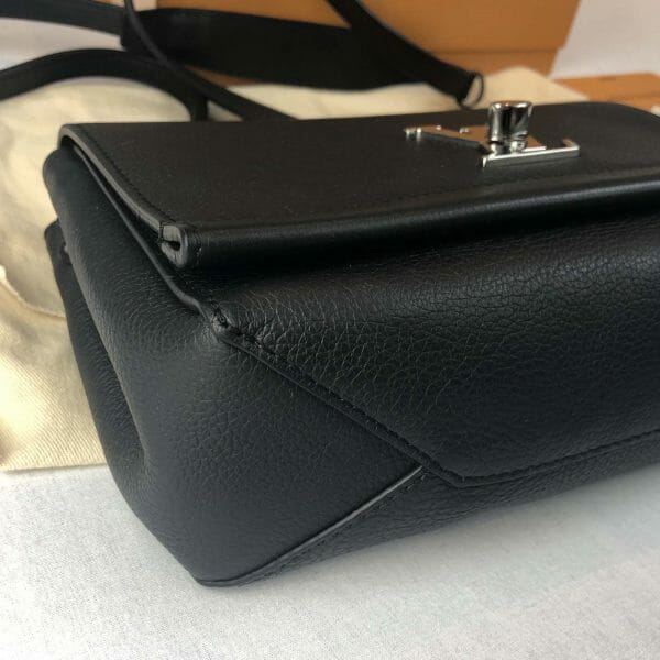 Louis Vuitton lock me bb bag in black with silver bottom corner